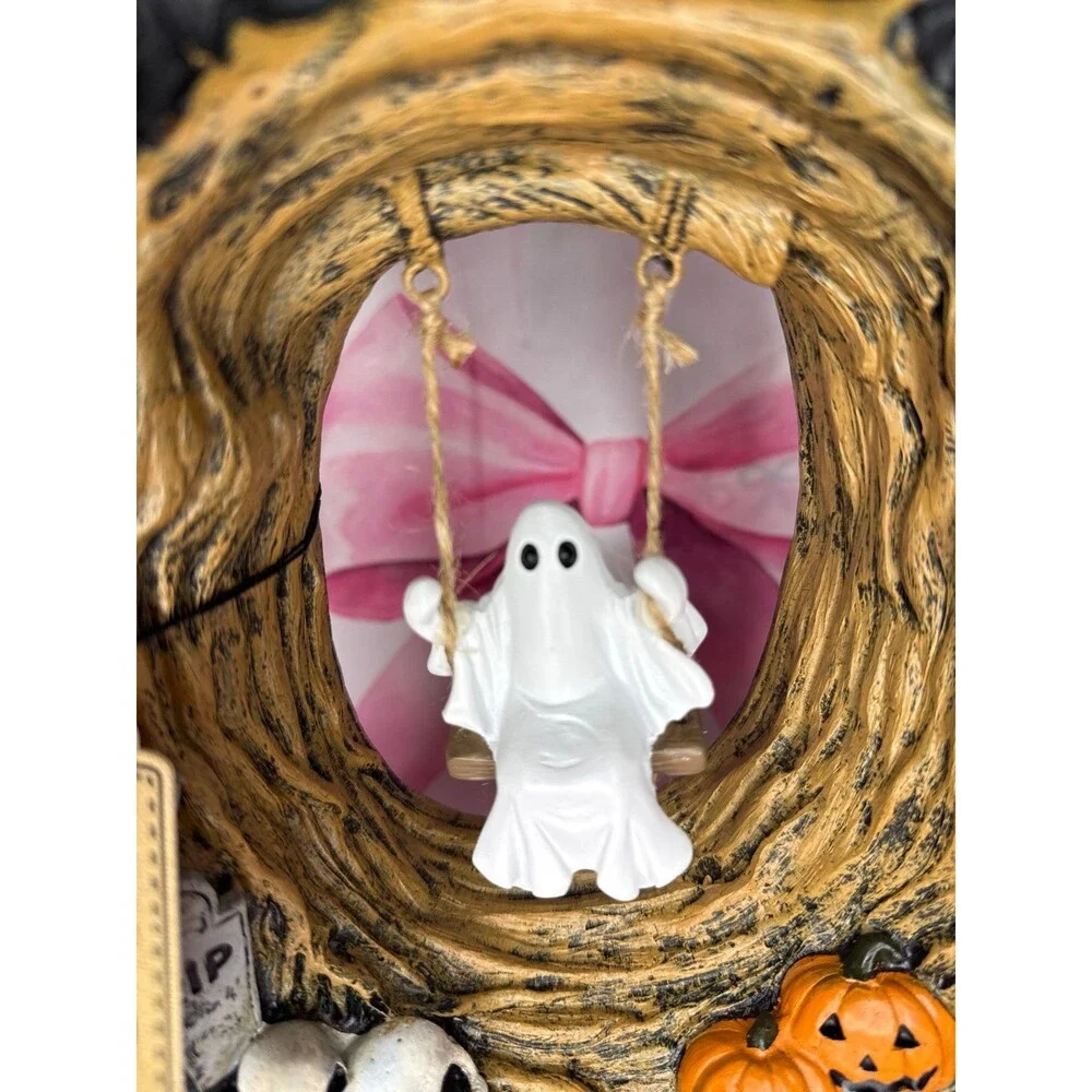 Halloween Ghost Swinging on Tree inside a book